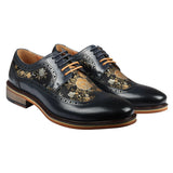Ross - meeste lillelise mustriga nahast tumesinised brogue-kingad