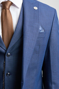 James meeste kolmeosaline tumesinine rätsepatööna valminud ülikond