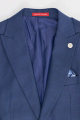 James meeste kolmeosaline tumesinine rätsepatööna valminud ülikond