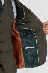 Kurt meeste salveiroheline kolmeosaline rätsepatööna valminud ülikond suvisteks pulmadeks