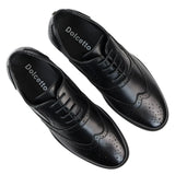 Meeste mustad brogue-kingad