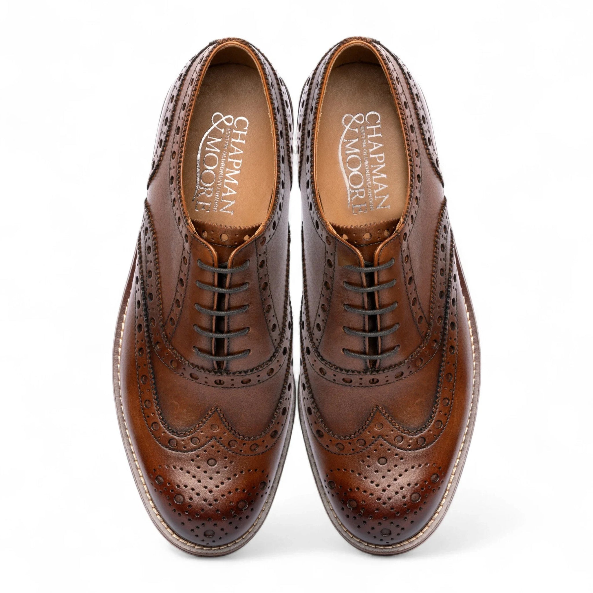 Meeste pruunid tiivakujulised brogue-mustriga Oxfordi kingad