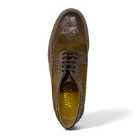 Meeste pruunid seemisnahast brogue-kingad