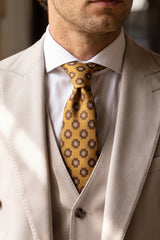 Meeste kuldne paisley-mustriga lips