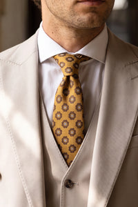 Meeste kuldne paisley-mustriga lips
