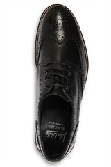 Stokes - meeste mustad nahast tiivakujulised brogue-nahast paeltega kingad