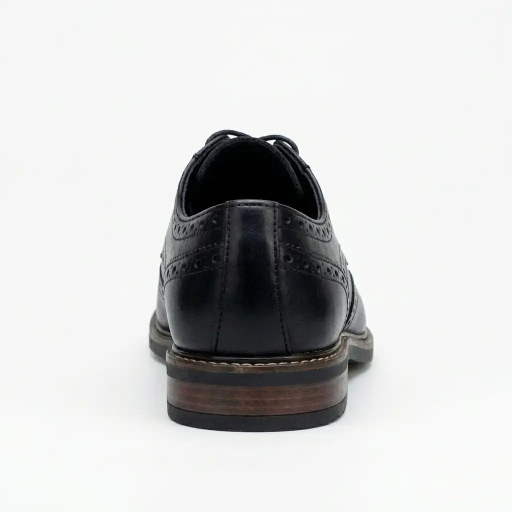 Stokes - meeste mustad nahast tiivakujulised brogue-nahast paeltega kingad