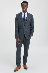 Meeste kolmeosaline tumesinine ülikond kaherealise vestiga